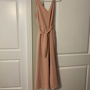 Romper! Pants Type. Open back.